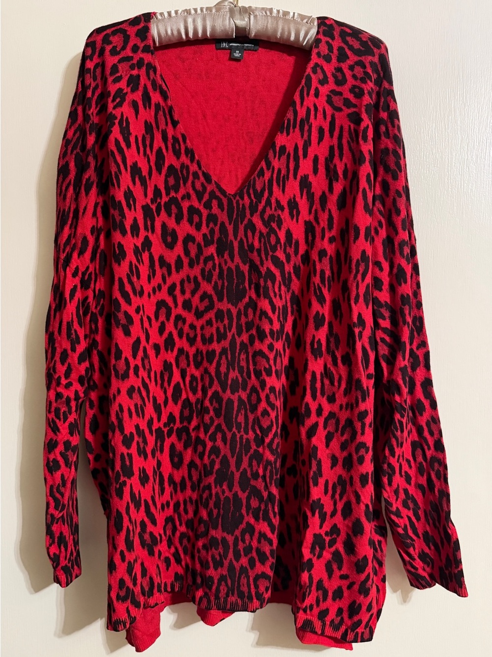 Red animal print vneck sweater